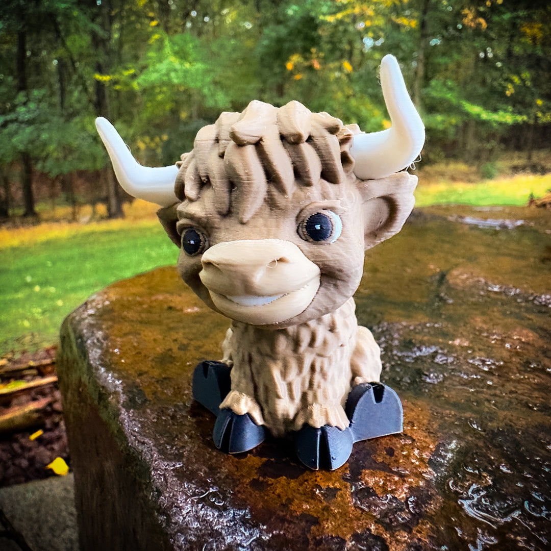 Toy figure of a creature with horns on a tree stump in a forest setting