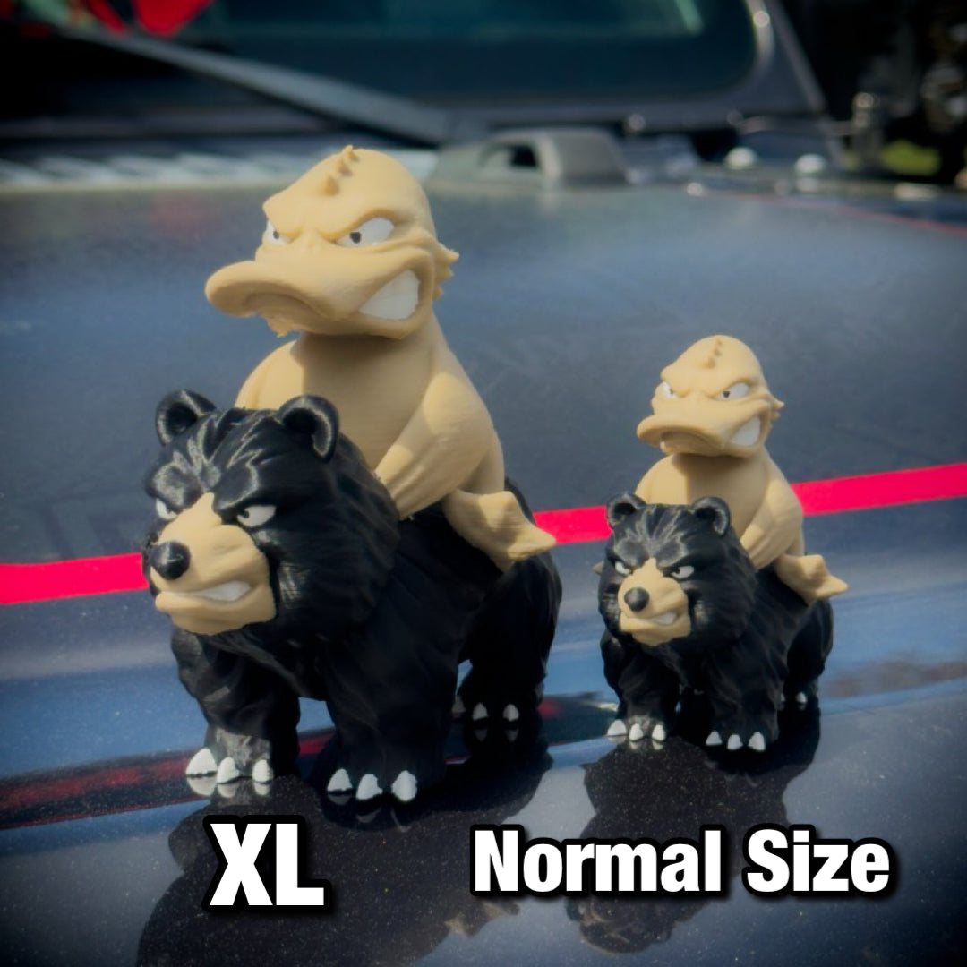 Three toy figures of a bear and a duck on a car hood, labeled XL and Normal Size.